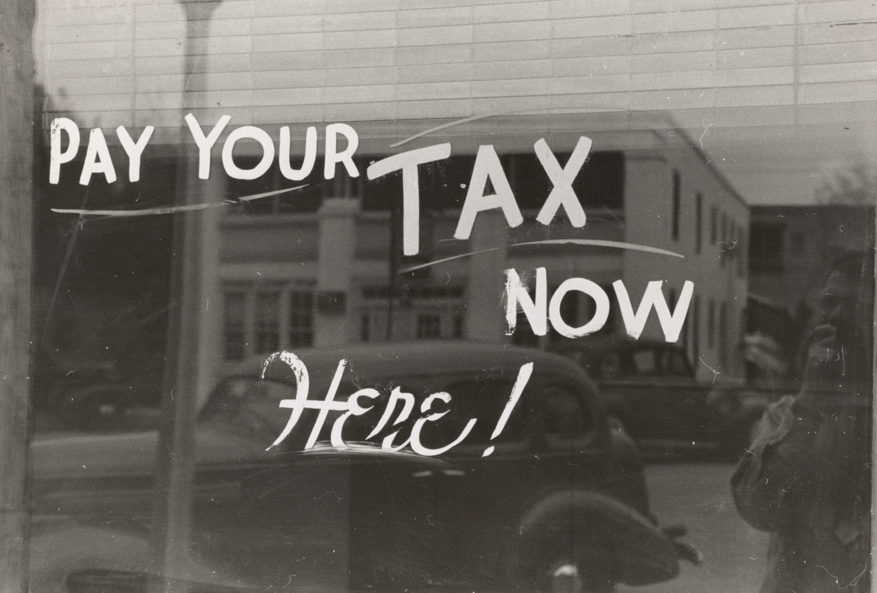 small business pay your tax sign